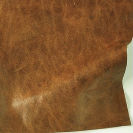 Milled grain bovine leather